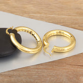 AuraHoop™ Bold Copper Circle Earrings – Four Styles of Effortless Elegance
